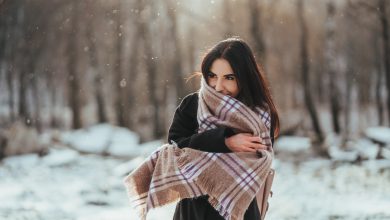 young beautiful model posing in winter forest stylish fashion portrait